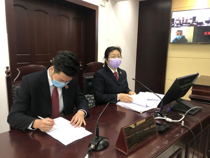 “線上”公訴讓防疫辦案兩不誤-配圖.jpg